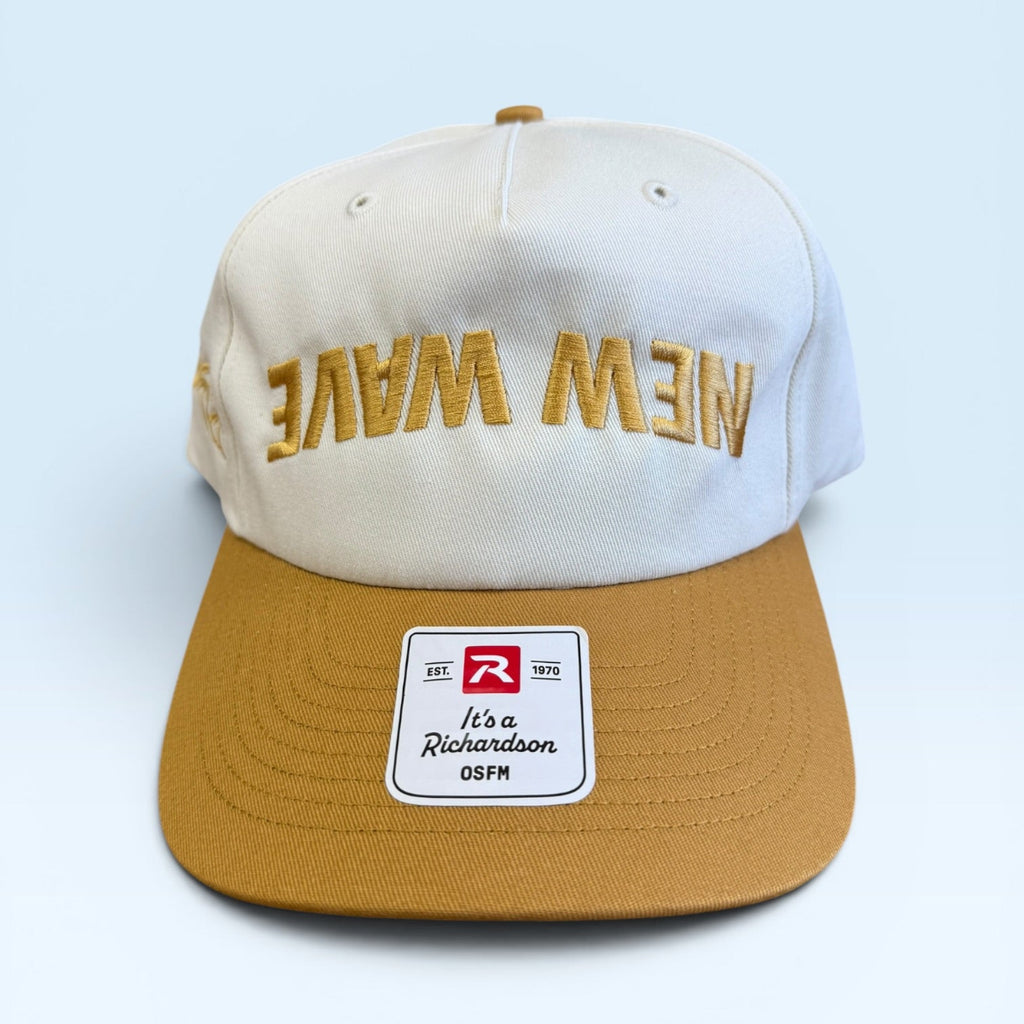 White and brown cap with 'New Wave' text and a logo on a light blue background